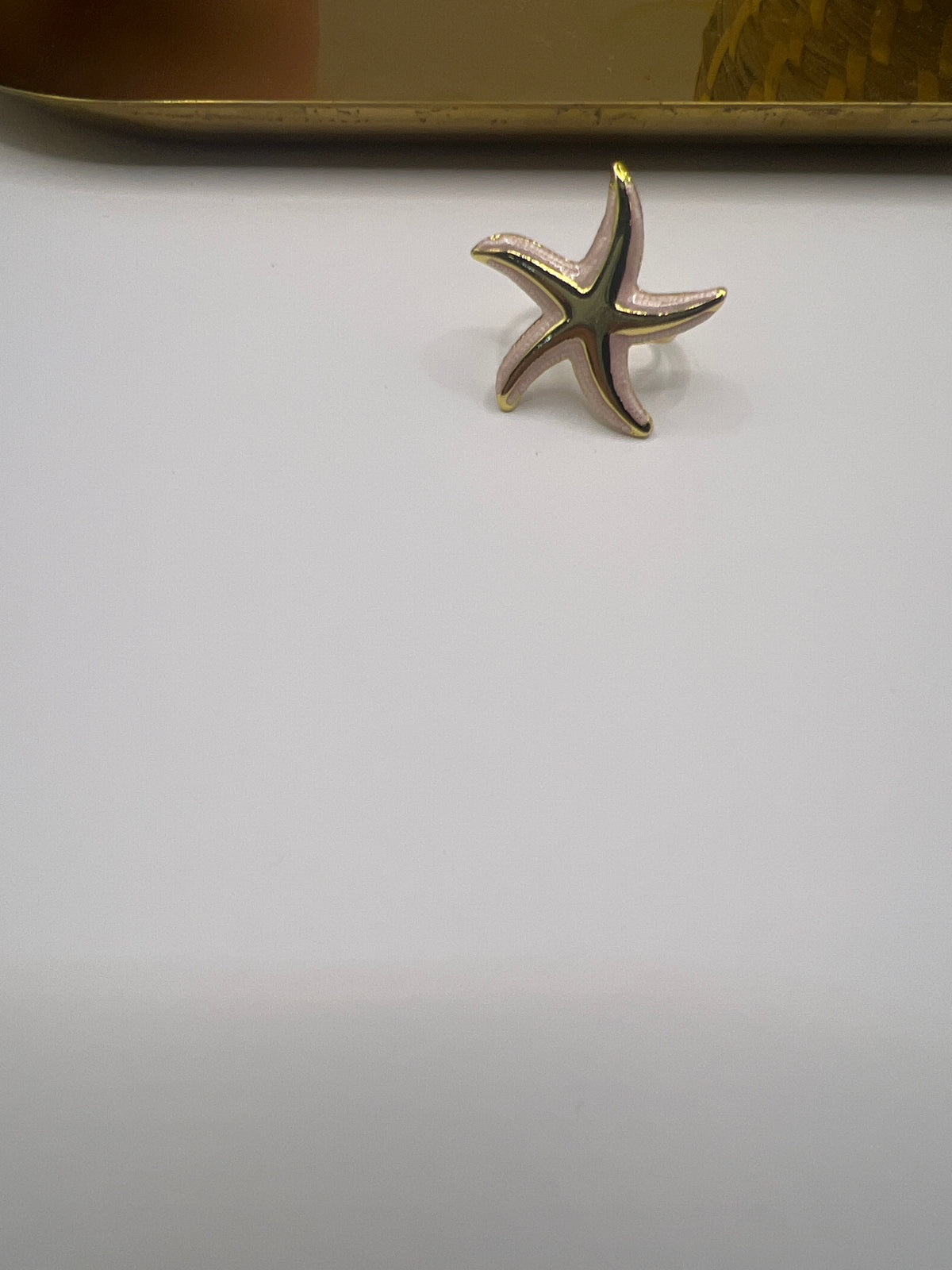 Embrace beach - chic vibes with pink starfish ring