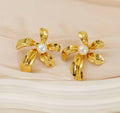 Charming floral shaped gold stud earrings
