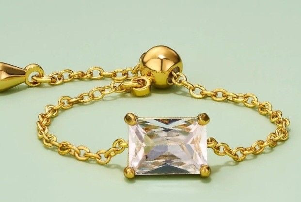 Adjustable gold - chain ring