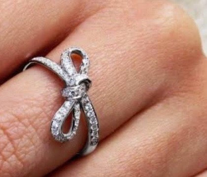 Silver bow ribbon ring