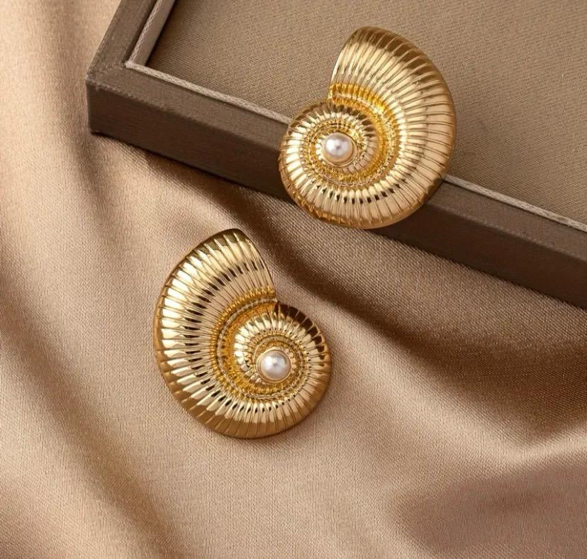 Textured seashell inspired gold earrings with a  pearl