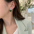 earing green bow