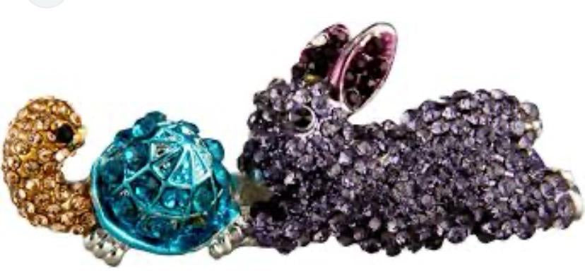 Handcrafted with intricate detailing and sparkling crystal stones