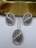 Silver coloured glass jewel set