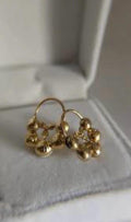 Clustered Gold tone charm earrings