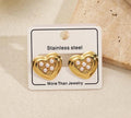 Heart shaped gold studs earrings with pearl