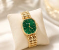 Octagon-shaped emerald green dial golden watch