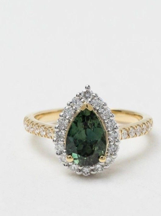Green stone golden ring