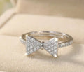 Silver stones bow ring