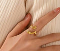 golden hand ring