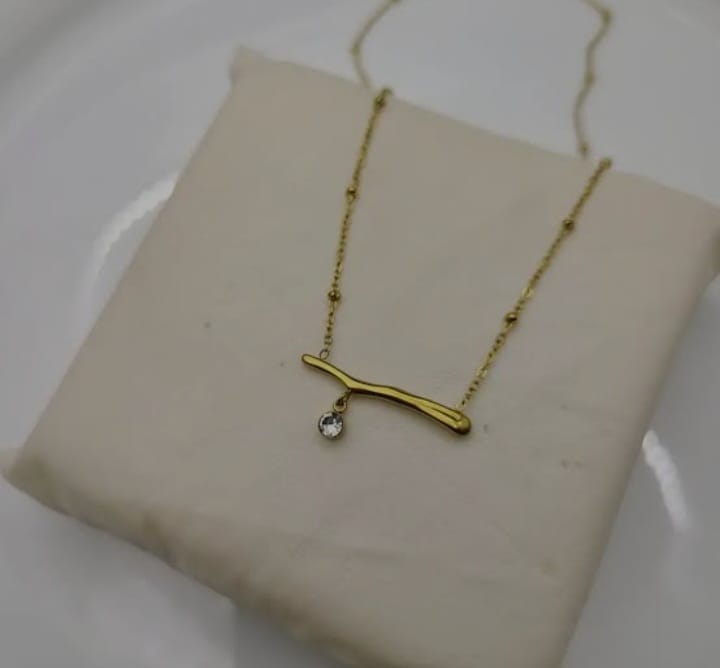 golden stone necklace