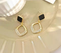 golden black earings
