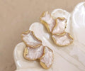 white pastle earings