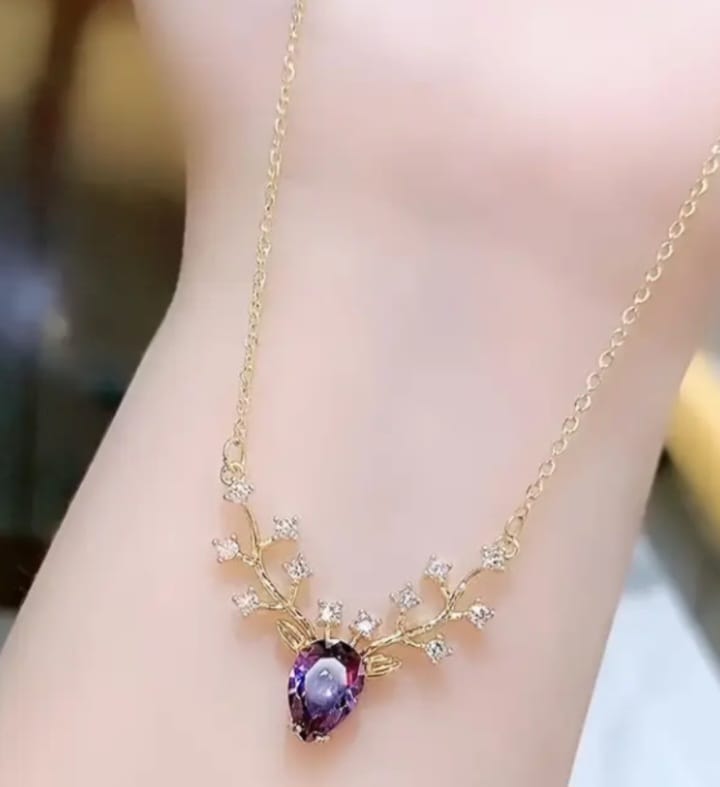 purple stone golden necklace