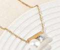 golden pearrl n stone necklace