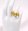 pearl bow golden ring