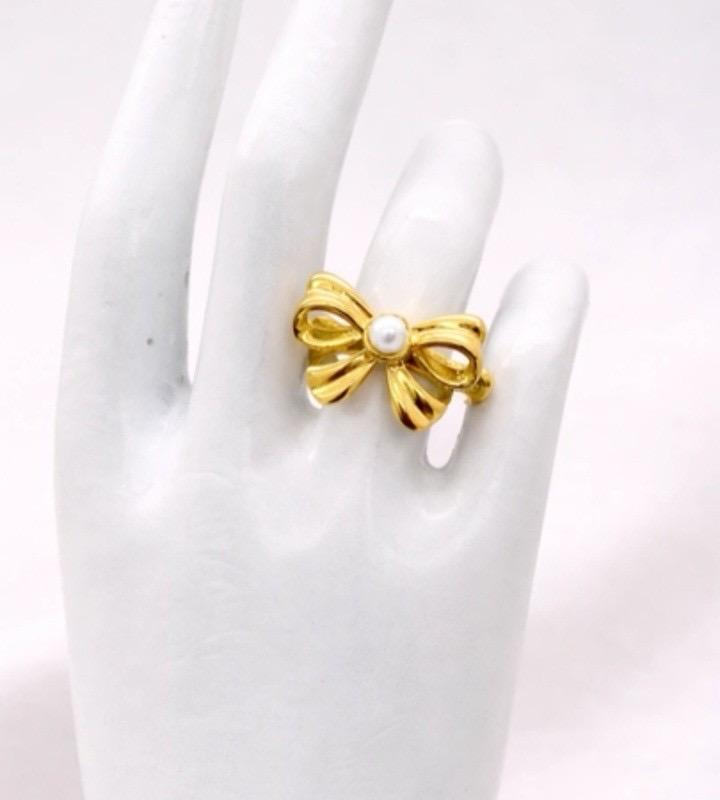 pearl bow golden ring