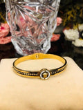 black n golden braclet