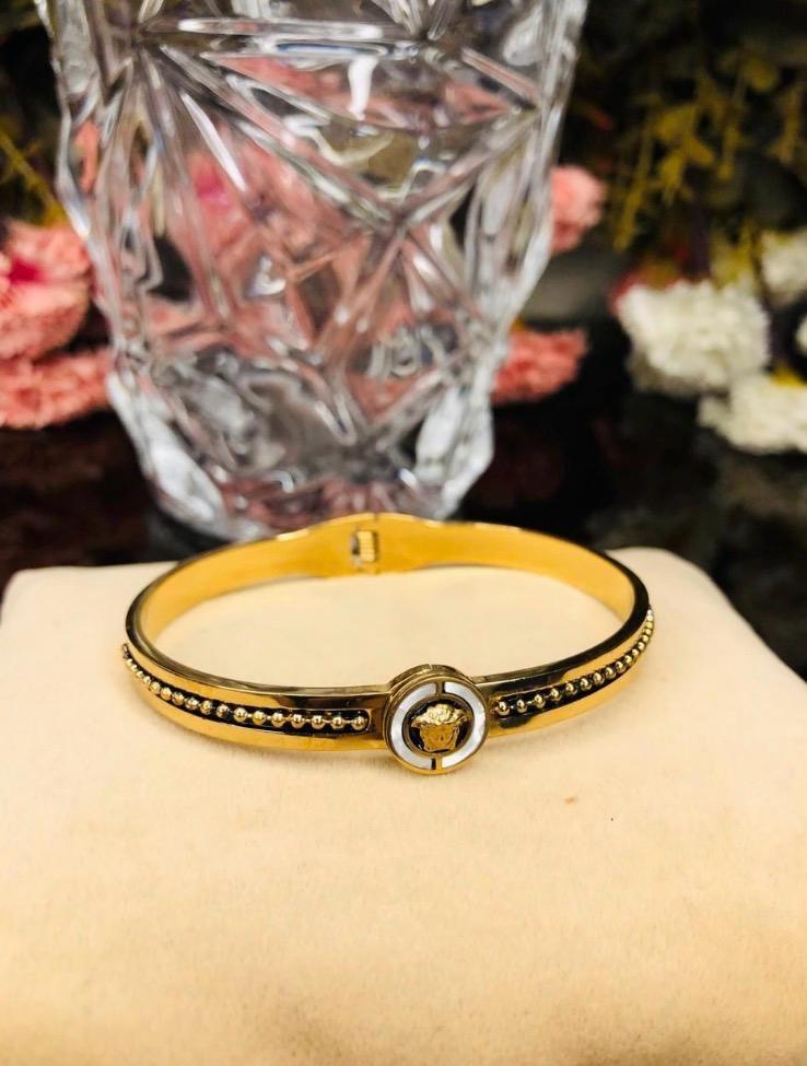 black n golden braclet
